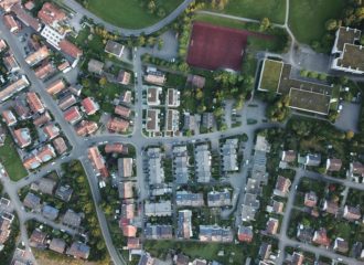 Aerial view of residential neighbourhood. Photo by Julian Grüneberg on Unsplash